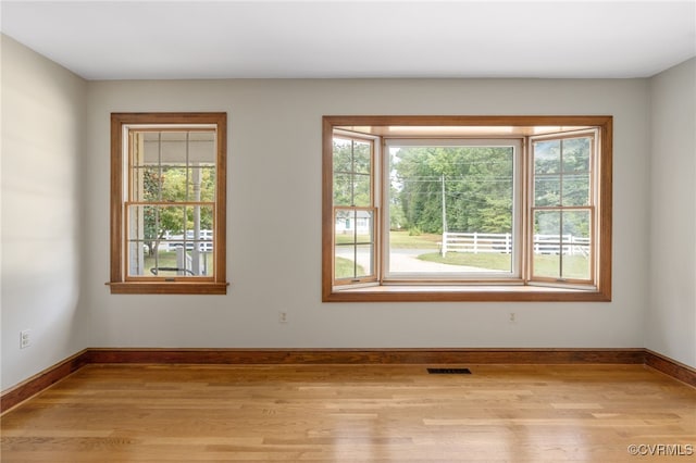 empty room featuring light hardwood / wood-style floors