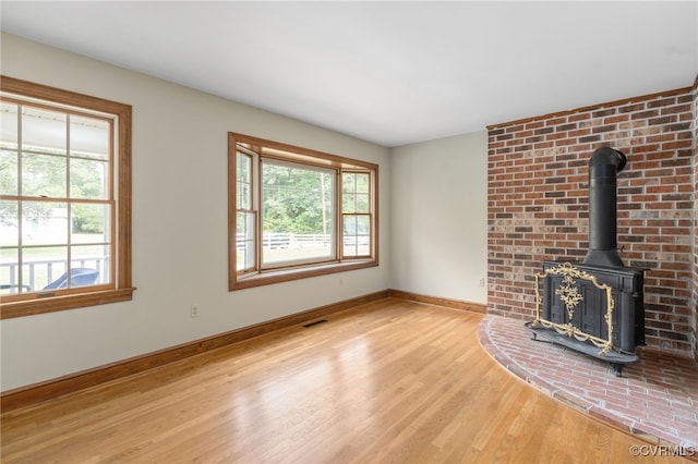 unfurnished living room featuring light hardwood / wood-style flooring