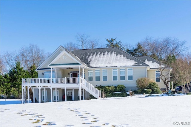 view of front of home with ceiling fan and covered porch