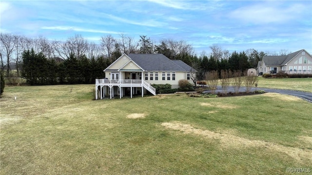 exterior space featuring a front yard and covered porch