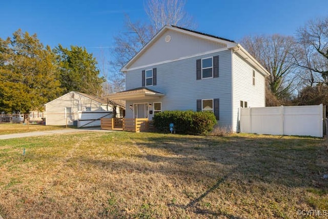 view of front property with a front yard and covered porch