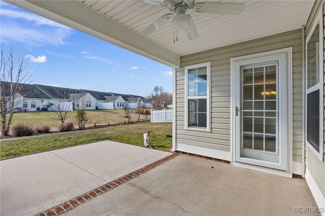 view of patio featuring ceiling fan