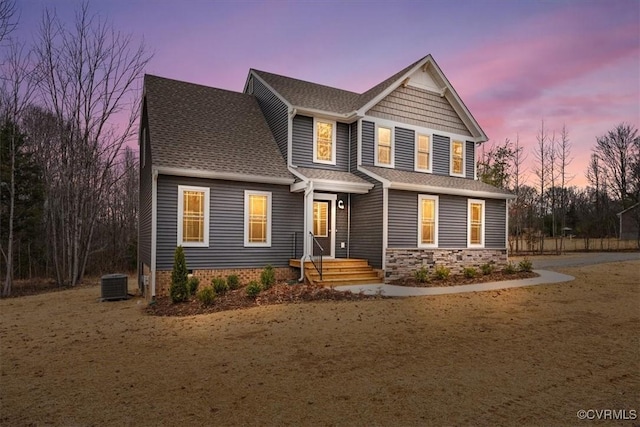 craftsman-style home with central AC unit