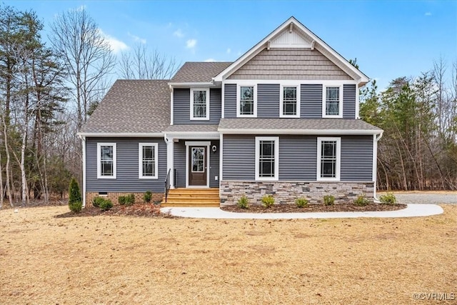 craftsman inspired home featuring a front yard