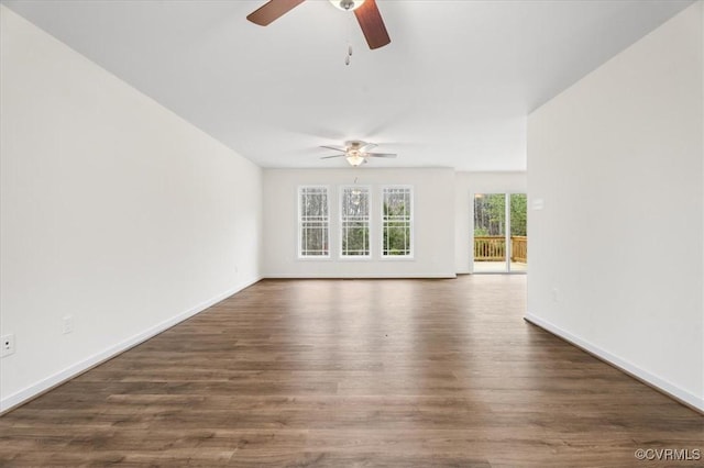 unfurnished living room featuring dark hardwood / wood-style floors