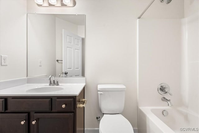 full bathroom featuring vanity,  shower combination, and toilet