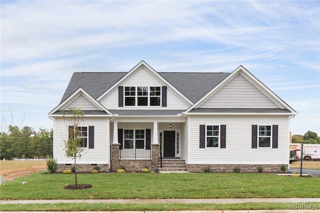 craftsman-style house with covered porch and a front lawn