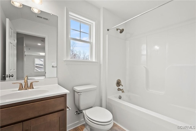 full bathroom with vanity, toilet, and bathing tub / shower combination