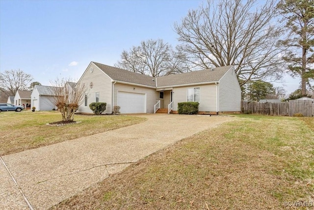 view of front of house with a front yard and a garage