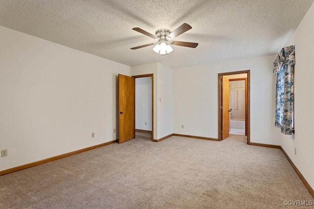 unfurnished bedroom with connected bathroom, ceiling fan, light carpet, and a textured ceiling