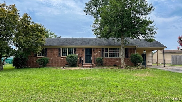 single story home featuring a carport and a front lawn