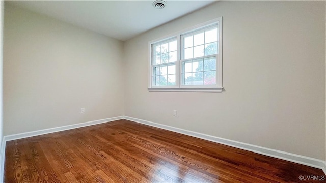 unfurnished room featuring wood-type flooring