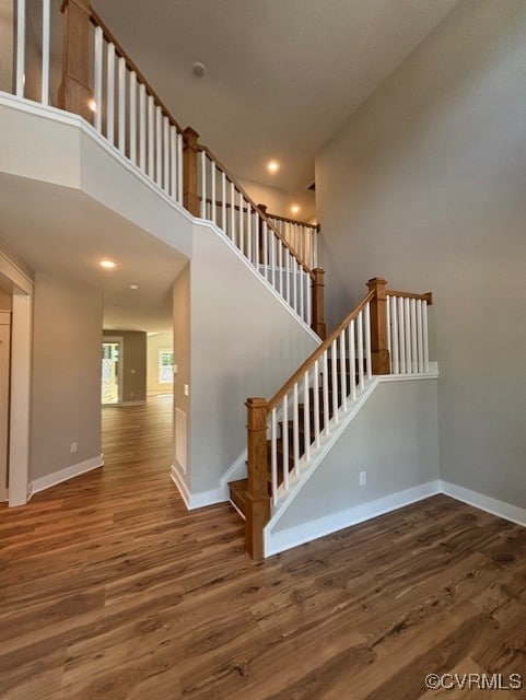 TBD1 Park St, Ashland, VA 23005 - staircase featuring wood finished floors, recessed lighting, and a towering ceiling