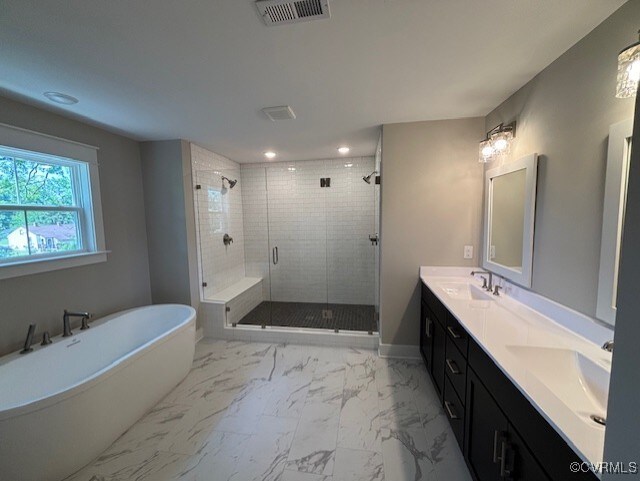 TBD1 Park St, Ashland, VA 23005 - full bathroom with a stall shower, double vanity, marble finish flooring, a freestanding bath, and recessed lighting