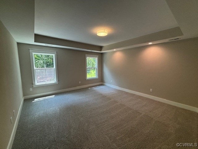 TBD1 Park St, Ashland, VA 23005 - carpeted spare room featuring a tray ceiling and baseboards