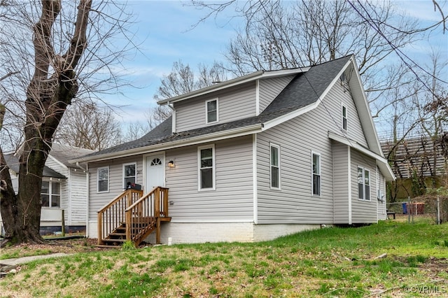 view of front of home with a front yard