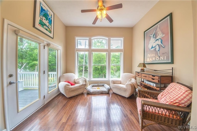 sunroom featuring ceiling fan and a healthy amount of sunlight