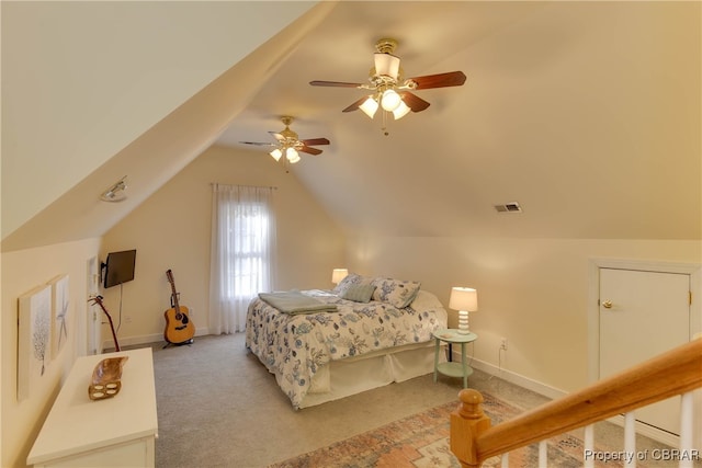 carpeted bedroom featuring ceiling fan and lofted ceiling