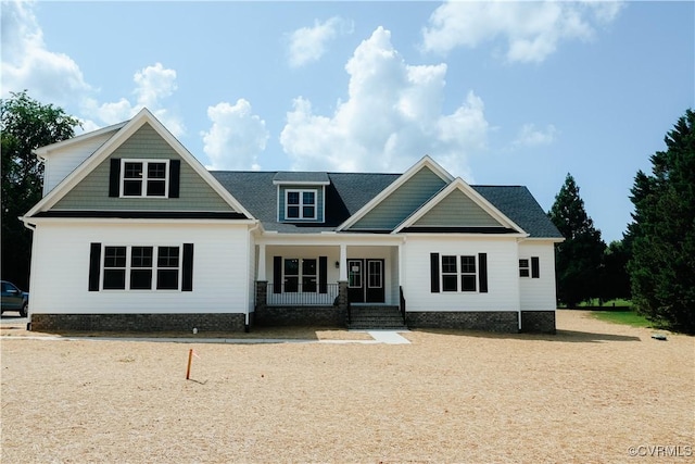 craftsman-style home featuring covered porch