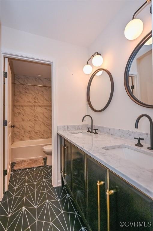 full bathroom with shower / bath combination, tile patterned floors, toilet, and vanity