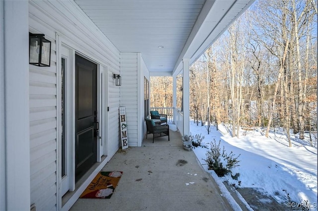 view of snow covered patio