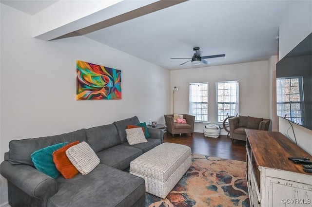 living room with dark hardwood / wood-style floors and ceiling fan