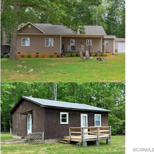 rear view of house featuring a wooden deck and a yard