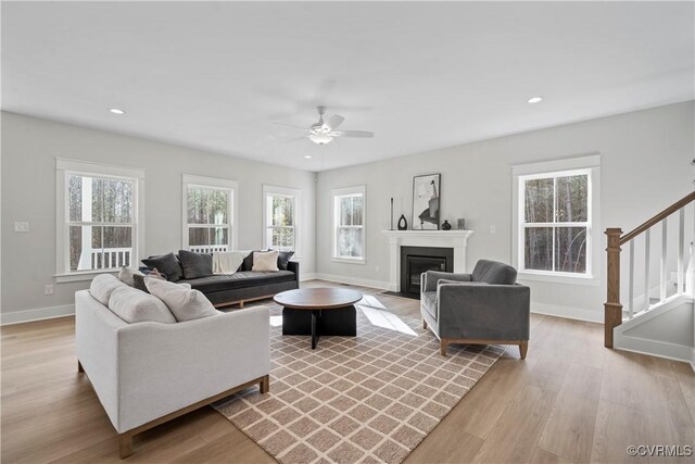3900 New Kent Hwy, Quinton, VA 23141 - living room with stairway, healthy amount of natural light, a ceiling fan, light wood finished floors, and recessed lighting