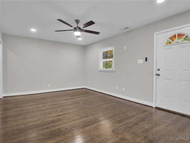 entrance foyer with ceiling fan and dark hardwood / wood-style flooring