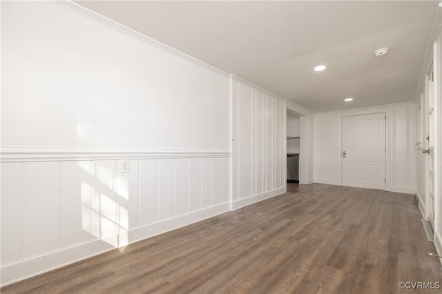 spare room with dark hardwood / wood-style flooring