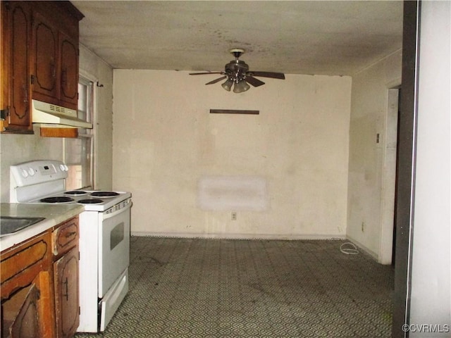 kitchen featuring white electric range oven and ceiling fan