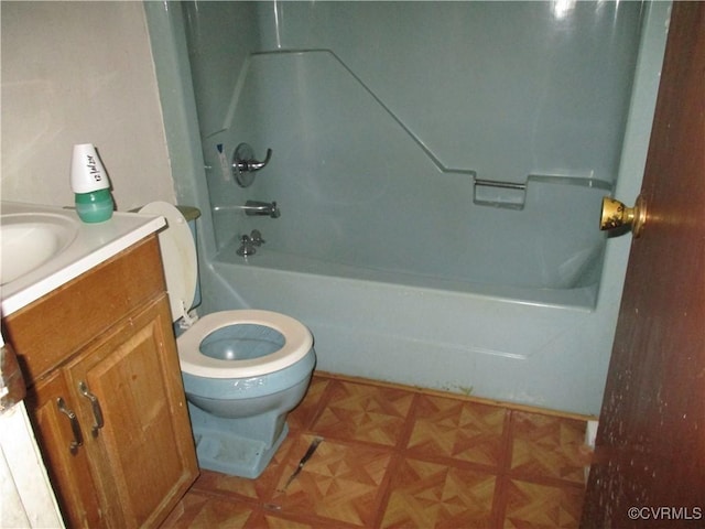 full bathroom with shower / tub combination, vanity, and toilet