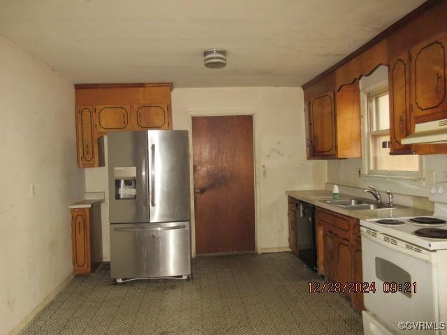 kitchen featuring black dishwasher, stainless steel fridge, white electric range, and sink