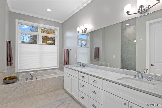 bathroom with vanity, separate shower and tub, and ornamental molding