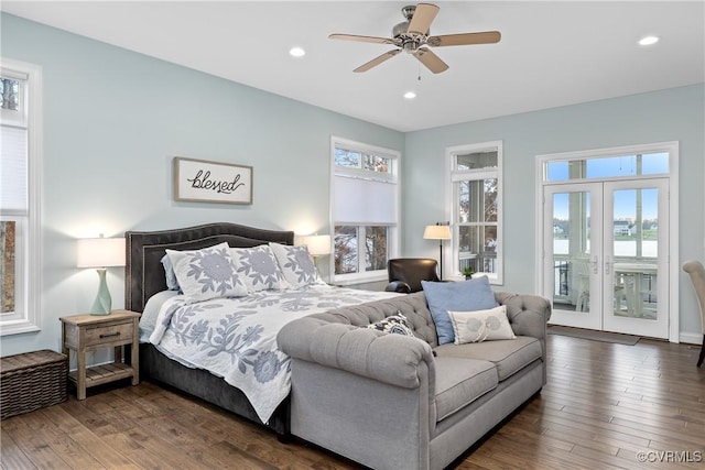 bedroom featuring access to exterior, ceiling fan, french doors, and dark wood-type flooring