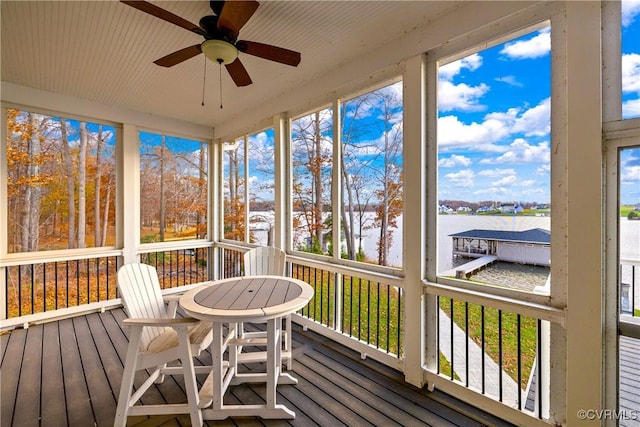 sunroom / solarium with ceiling fan