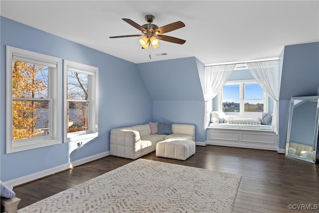 sitting room featuring dark hardwood / wood-style floors, ceiling fan, and lofted ceiling