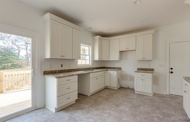 kitchen featuring white cabinetry