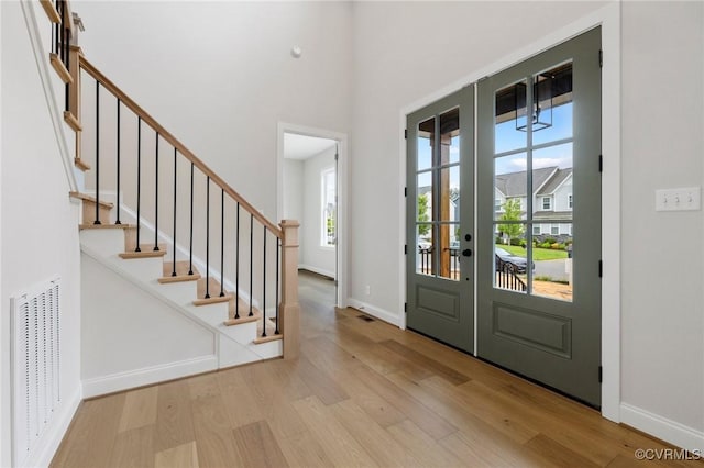 15812 W Millington Dr, Midlothian, VA 23112 - foyer entrance featuring wood finished floors, plenty of natural light, stairway, and a high ceiling