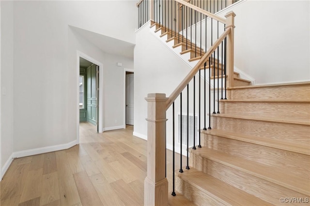 15812 W Millington Dr, Midlothian, VA 23112 - stairway featuring wood finished floors, baseboards, and a towering ceiling