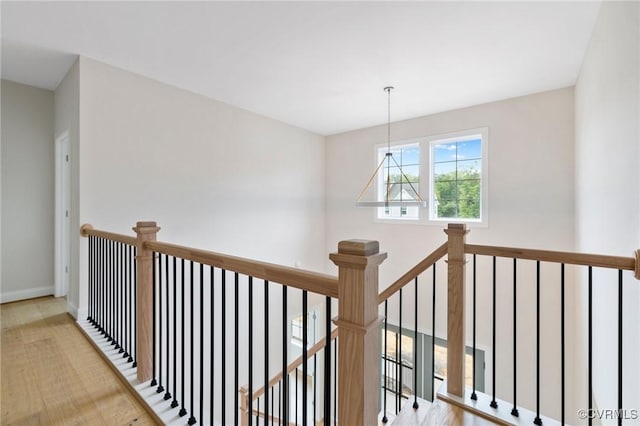15812 W Millington Dr, Midlothian, VA 23112 - hall featuring an upstairs landing, wood finished floors, baseboards, and a chandelier