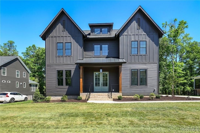 15812 W Millington Dr, Midlothian, VA 23112 - modern farmhouse style home featuring board and batten siding, a front yard, and french doors