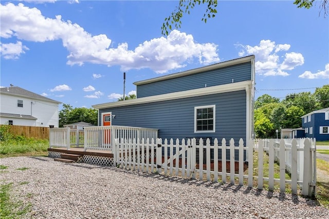 rear view of house with a deck