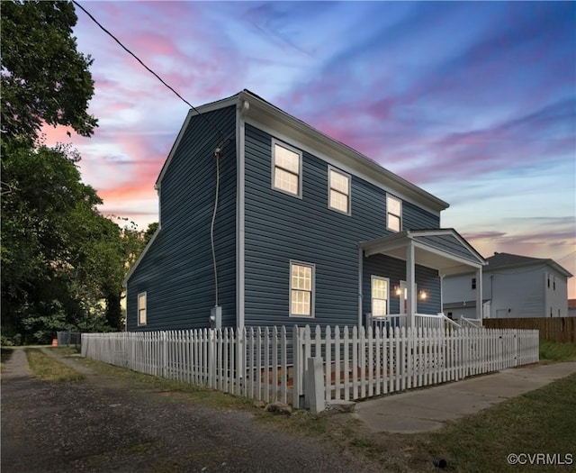 view of property exterior at dusk