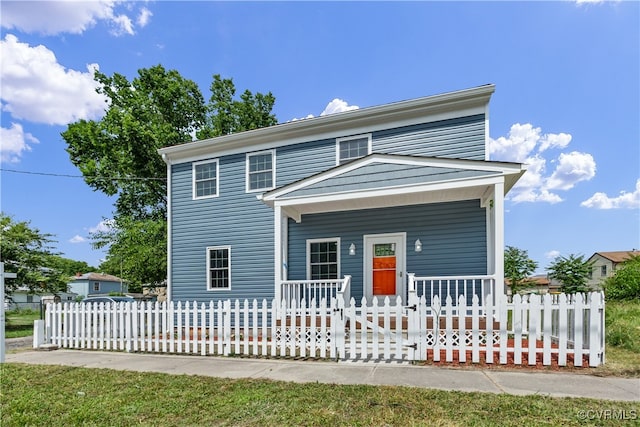 view of property featuring a porch