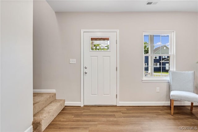 entryway featuring a healthy amount of sunlight and light hardwood / wood-style floors