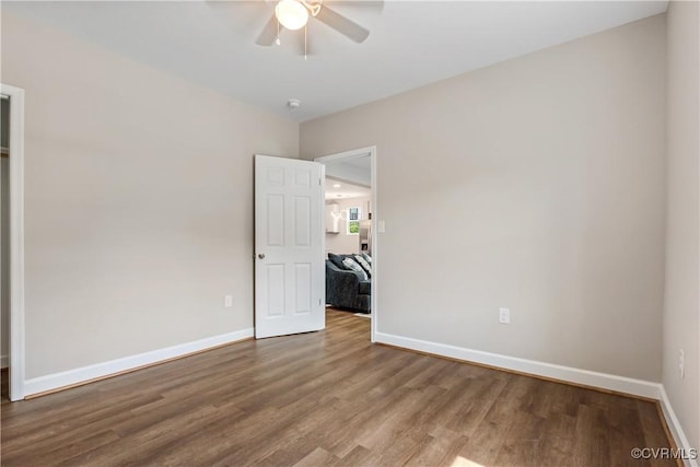 unfurnished bedroom with hardwood / wood-style flooring and ceiling fan