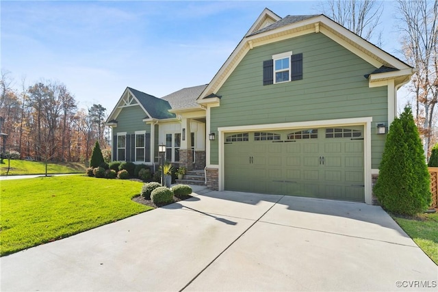 craftsman-style home with a garage and a front lawn