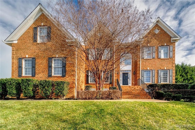 view of front of home with a front lawn