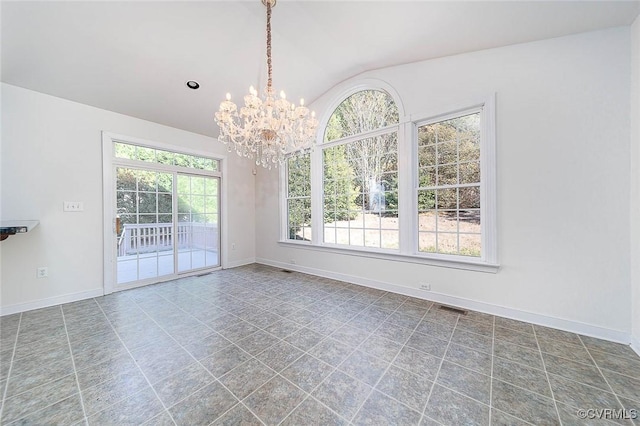 unfurnished dining area with a chandelier and vaulted ceiling